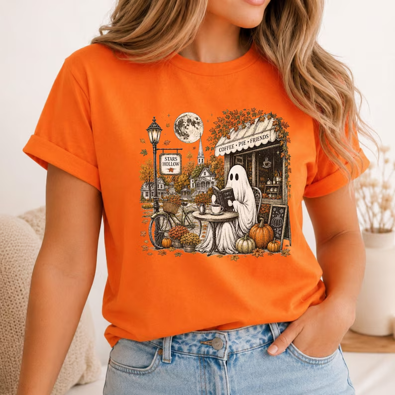 Ghost reading at a diner with pumpkins and a town setting