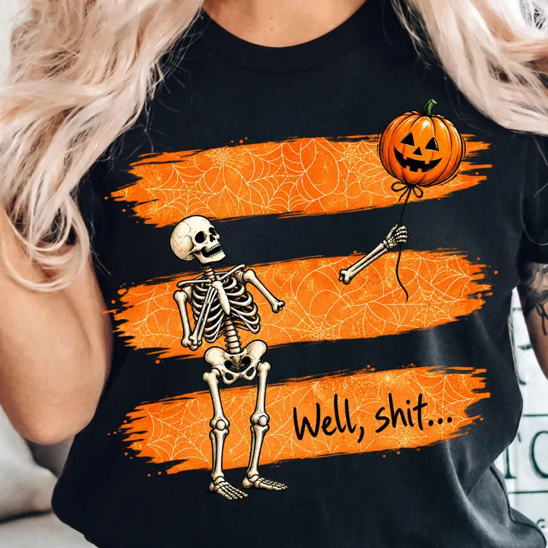 Skeleton with a lost arm holding a pumpkin balloon