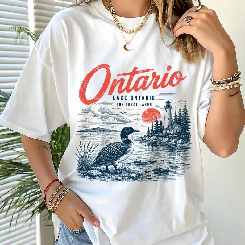 Vintage graphic tee with loon and lighthouse